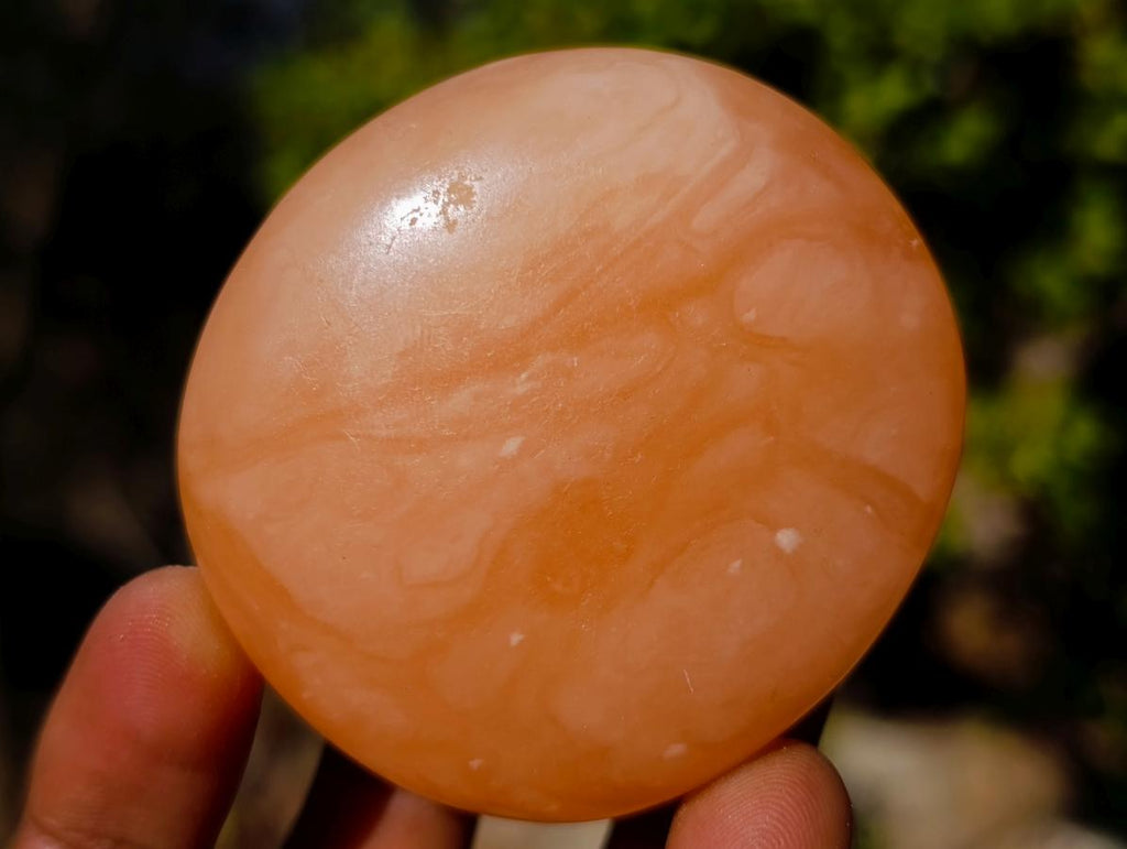Polished Orange Twist Calcite Galets x 24 From Maevantanana, Madagascar
