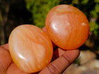 Polished Orange Twist Calcite Galets x 24 From Maevantanana, Madagascar