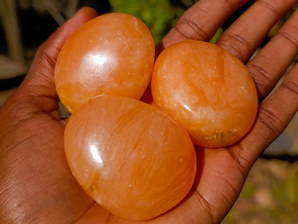 Polished Orange Twist Calcite Galets x 24 From Maevantanana, Madagascar