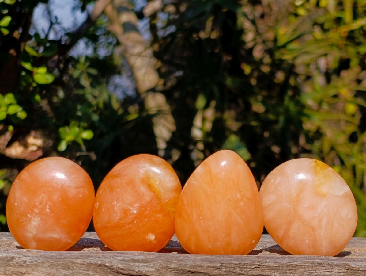 Polished Orange Twist Calcite Galets x 24 From Maevantanana, Madagascar