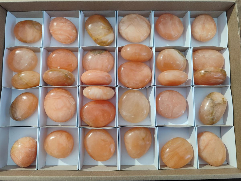 Polished Orange Twist Calcite Galets x 31 From Maevantanana, Madagascar