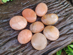 Polished Orange Twist Calcite Galets x 31 From Maevantanana, Madagascar
