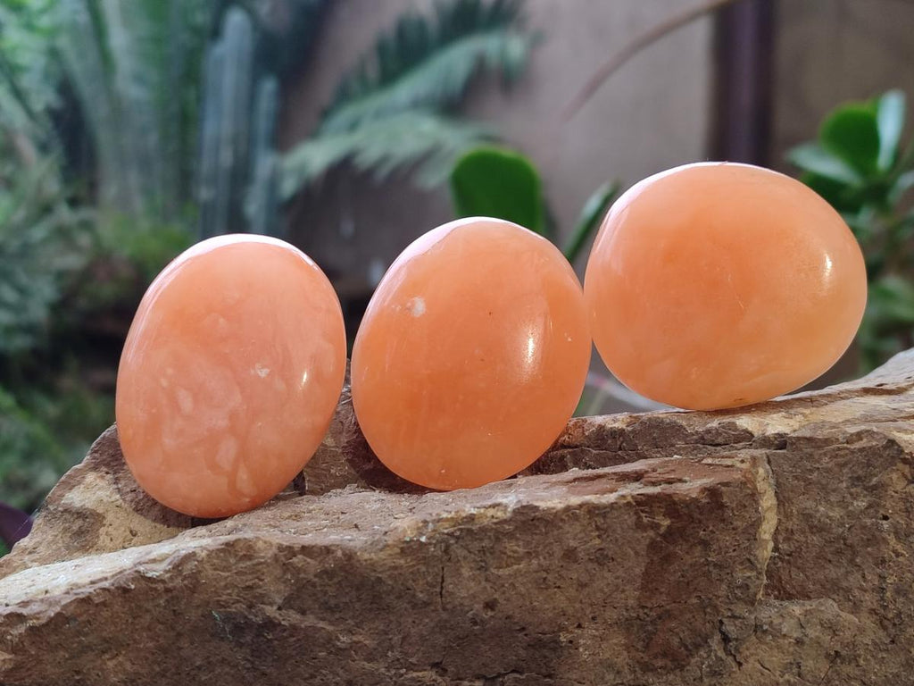 Polished Orange Twist Calcite Galets x 31 From Maevantanana, Madagascar