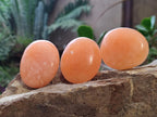 Polished Orange Twist Calcite Galets x 31 From Maevantanana, Madagascar