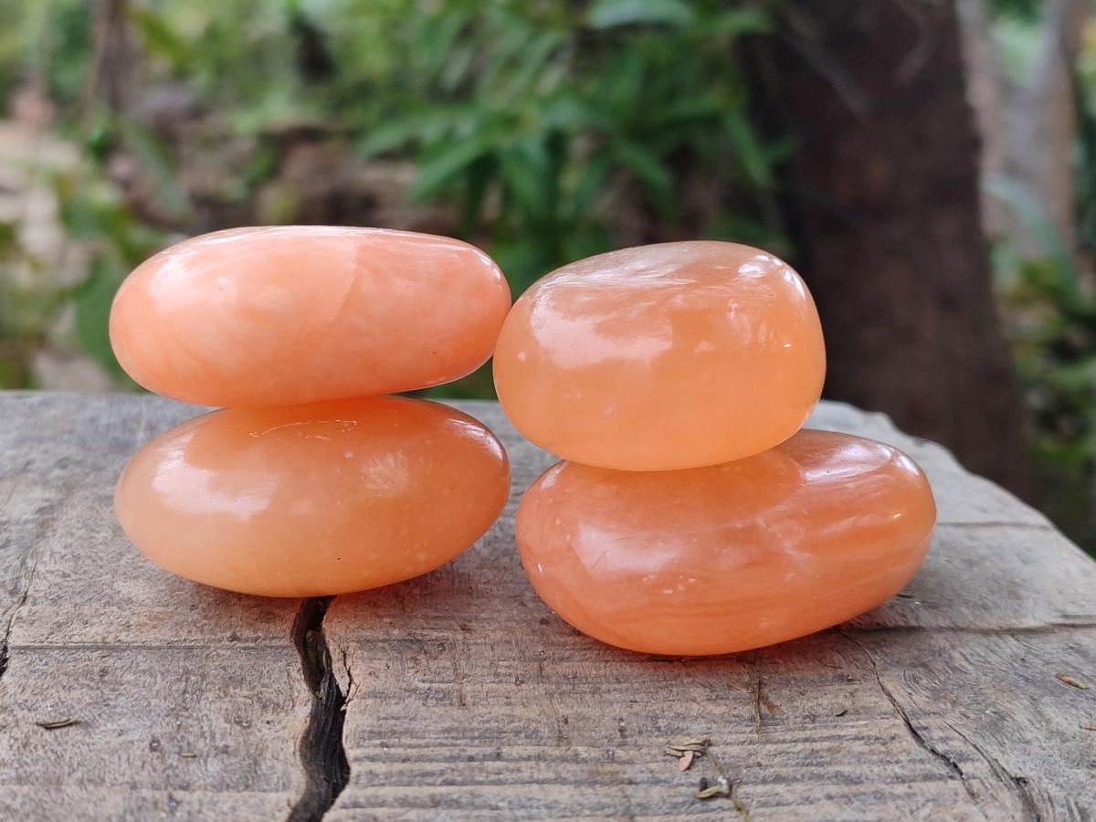 Polished Orange Twist Calcite Galets x 31 From Maevantanana, Madagascar