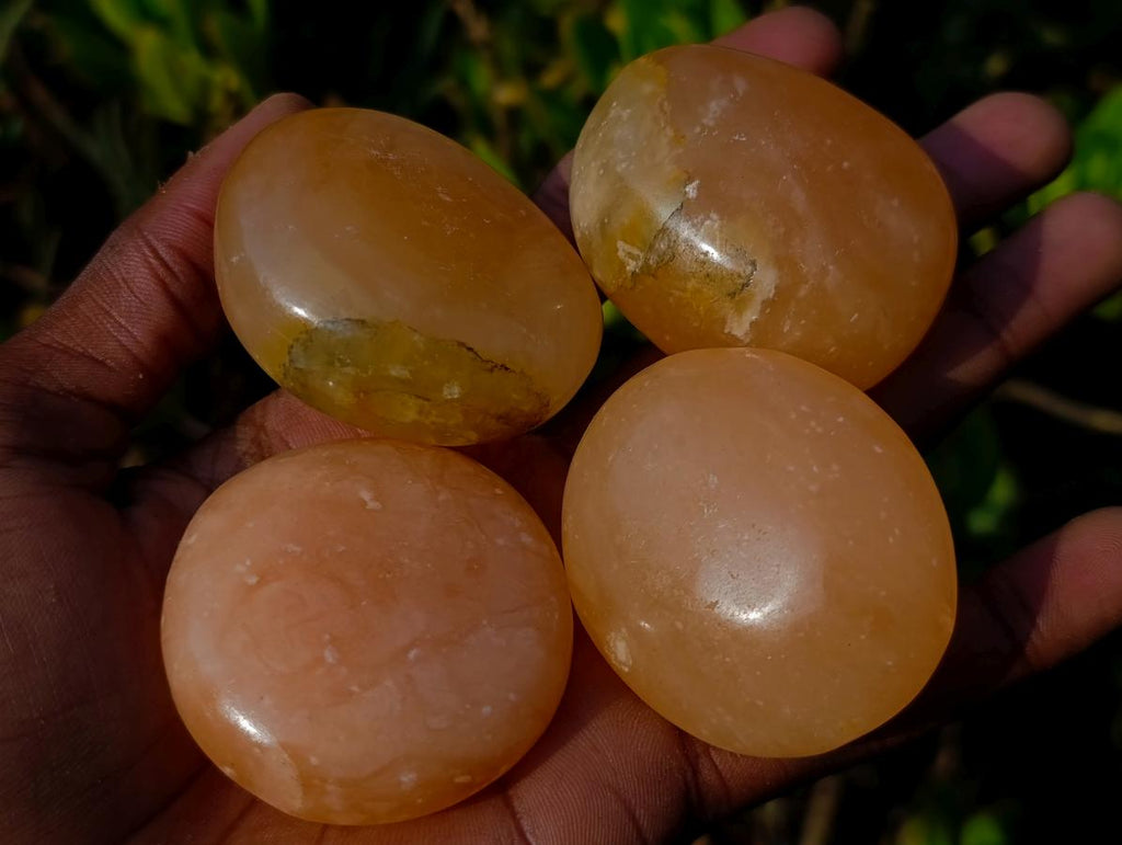 Polished Orange Twist Calcite Galets x 35 From Maevantanana, Madagascar