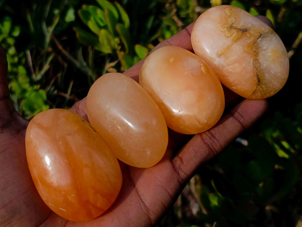 Polished Orange Twist Calcite Galets x 35 From Maevantanana, Madagascar
