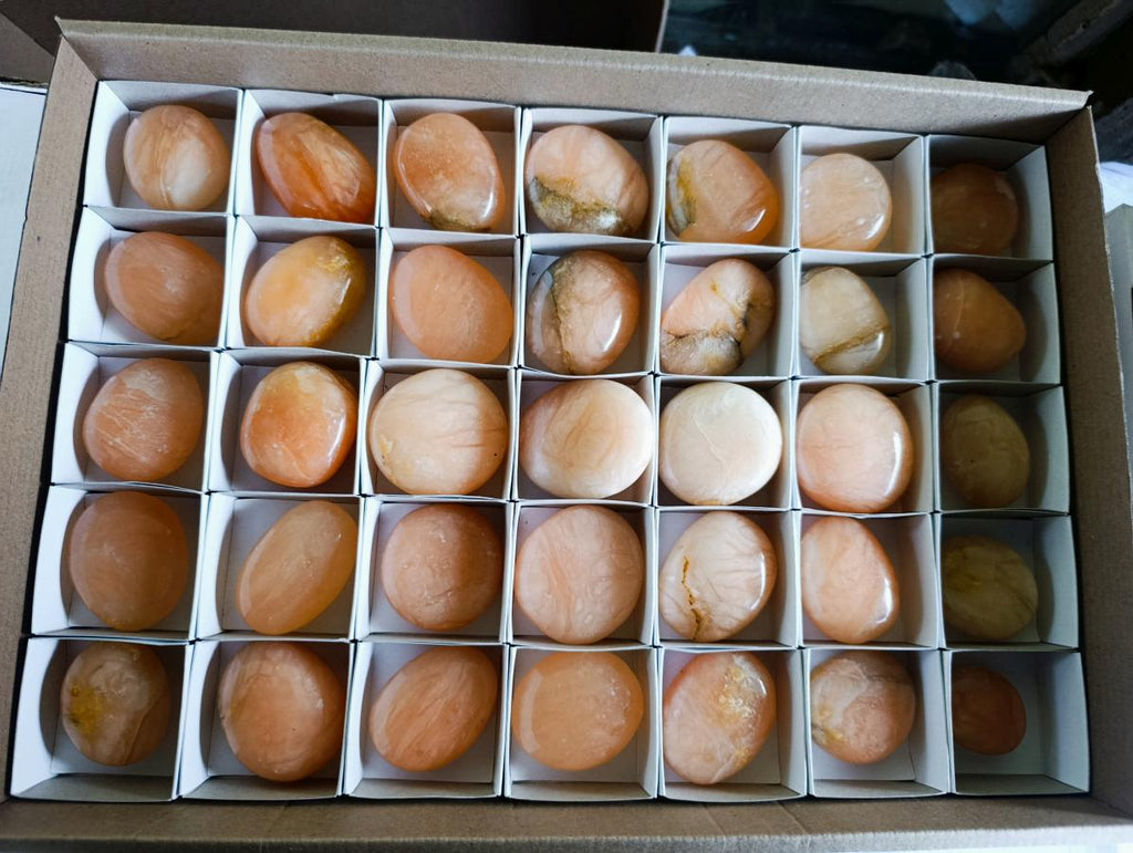 Polished Orange Twist Calcite Galets x 35 From Maevantanana, Madagascar