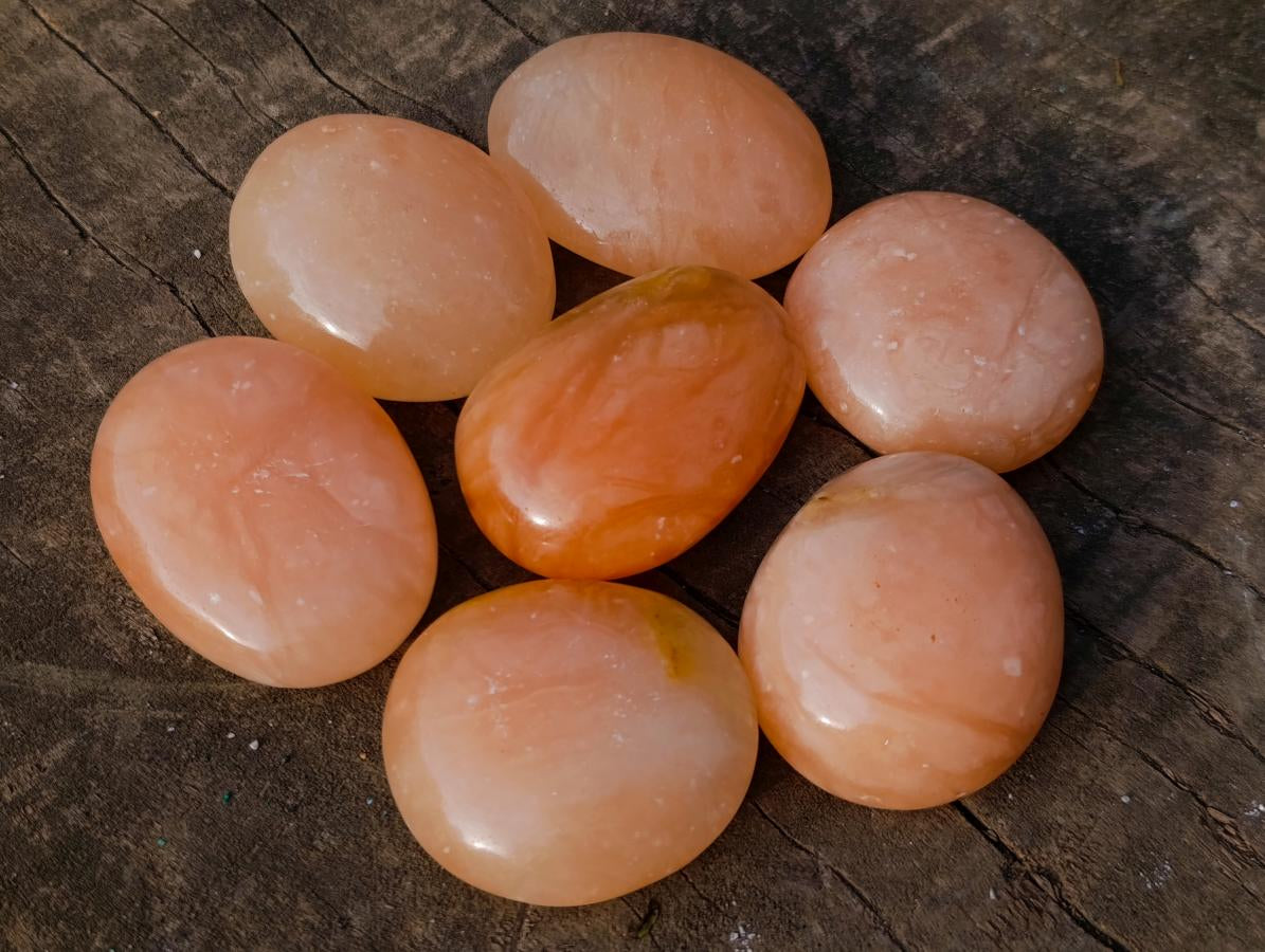 Polished Orange Twist Calcite Galets x 35 From Maevantanana, Madagascar
