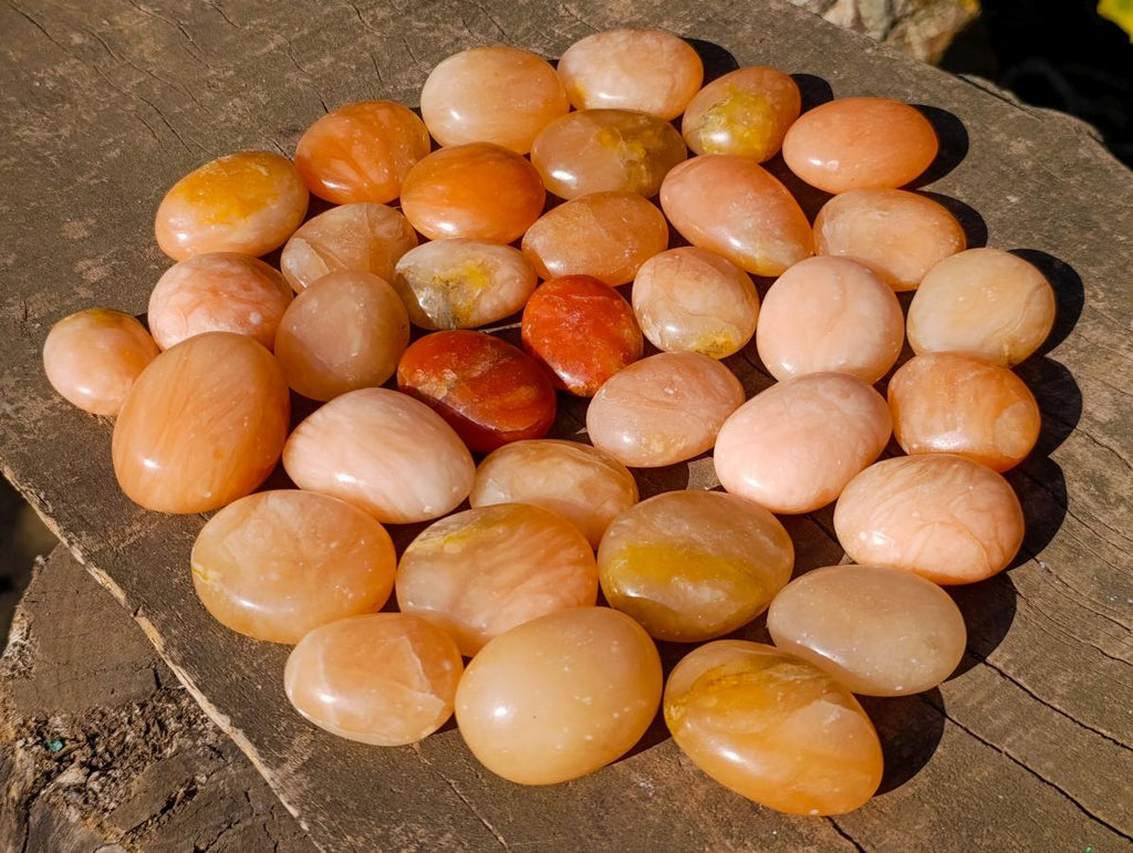 Polished Orange Twist Calcite Galets x 34 From Maevantanana, Madagascar - Toprock Gemstones and Minerals 