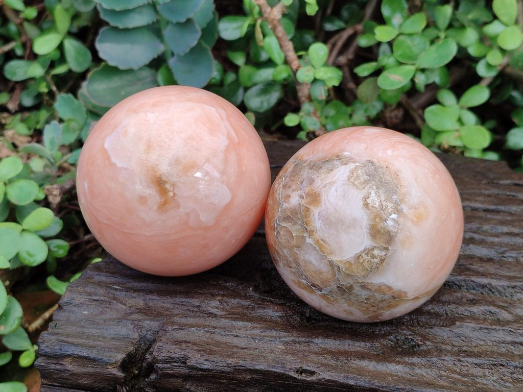 Polished Orange Twist Calcite Spheres x 2 From Madagascar - Toprock Gemstones and Minerals 