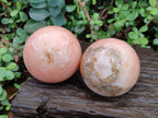 Polished Orange Twist Calcite Spheres x 2 From Madagascar - Toprock Gemstones and Minerals 