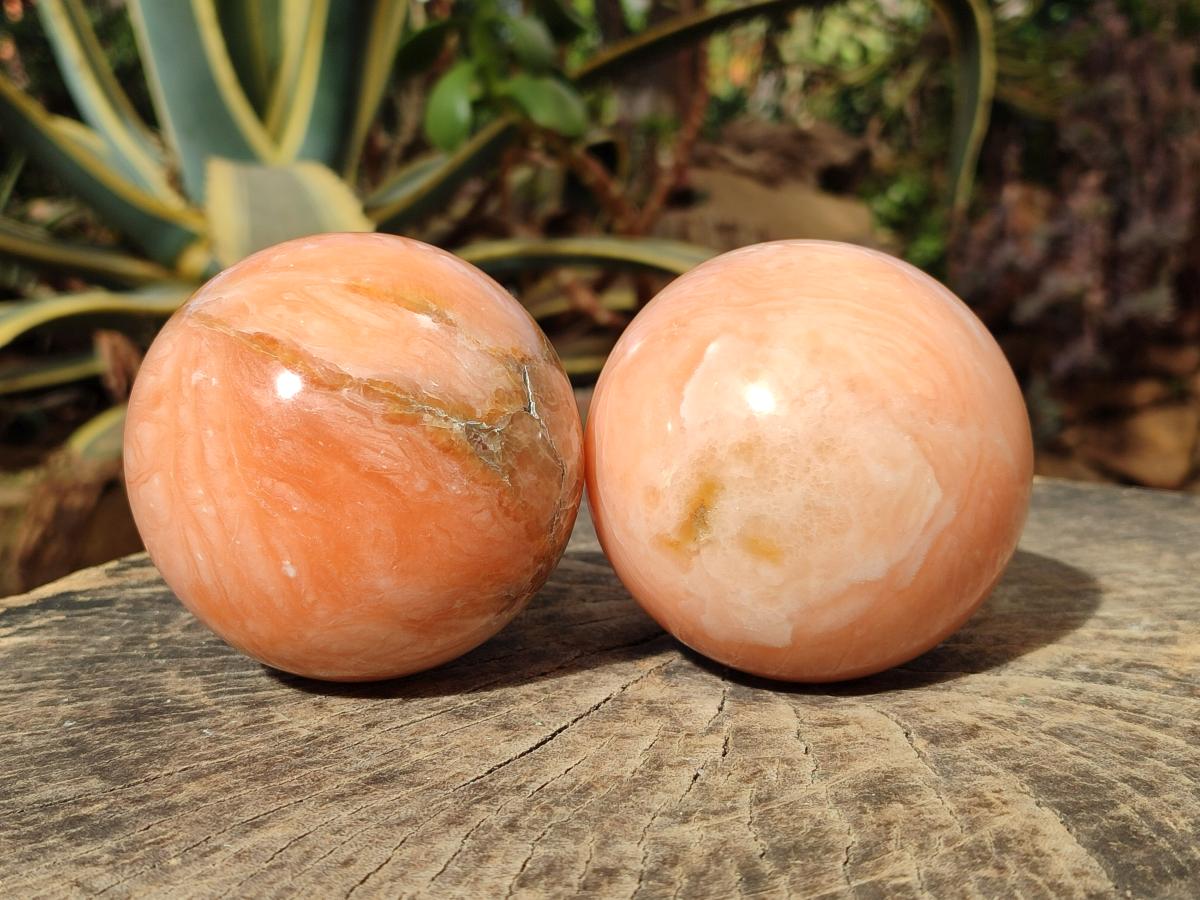 Polished Orange Twist Calcite Spheres x 2 From Madagascar - Toprock Gemstones and Minerals 