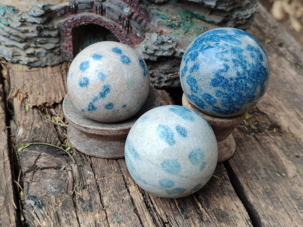 Polished Blue Spotted Spinel in Quartz Spheres x 6 From Madagascar - Toprock Gemstones and Minerals 