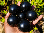 Polished Black Basalt Spheres x 12 From Madagascar - Toprock Gemstones and Minerals 