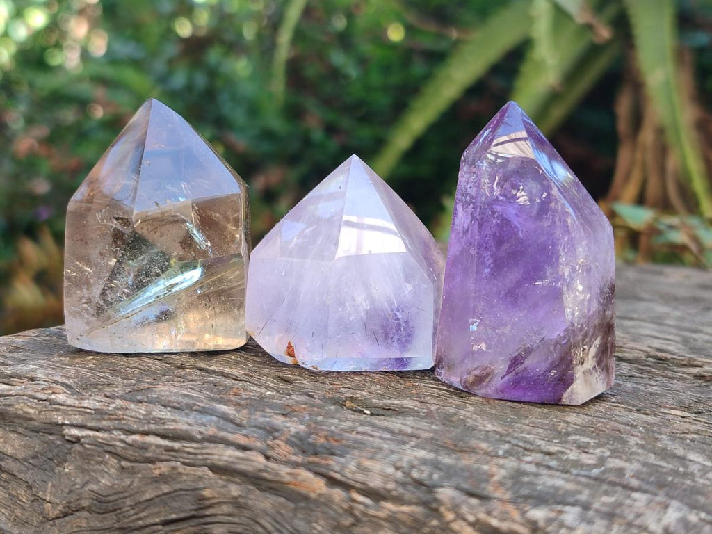 Polished Mix of Quartz Crystals with Inclusions x 12 From Madagascar