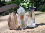 Polished Mix of Quartz Crystals with Inclusions x 12 From Madagascar