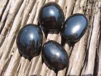 Polished Pitch Black Schorl Tourmaline Palm Stones / Gallets - sold per kg - From Madagascar - TopRock