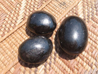 Polished Pitch Black Schorl Tourmaline Palm Stones / Gallets - sold per kg - From Madagascar - TopRock