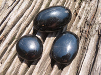 Polished Pitch Black Schorl Tourmaline Palm Stones / Gallets - sold per kg - From Madagascar - TopRock