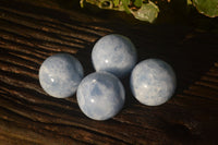 Polished Blue Calcite Spheres x 4 From Ihadilalana, Madagascar - Toprock Gemstones and Minerals 