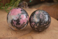 Polished  Pink & Black Rhodonite Spheres x 2 From Madagascar - Toprock Gemstones and Minerals 