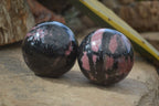 Polished Rhodonite Spheres x 2 From Ambindavato, Madagascar - Toprock Gemstones and Minerals 