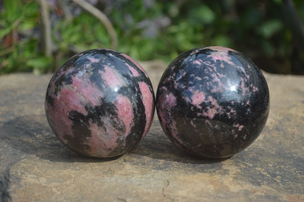 Polished Rhodonite Spheres x 2 From Ambindavato, Madagascar - Toprock Gemstones and Minerals 