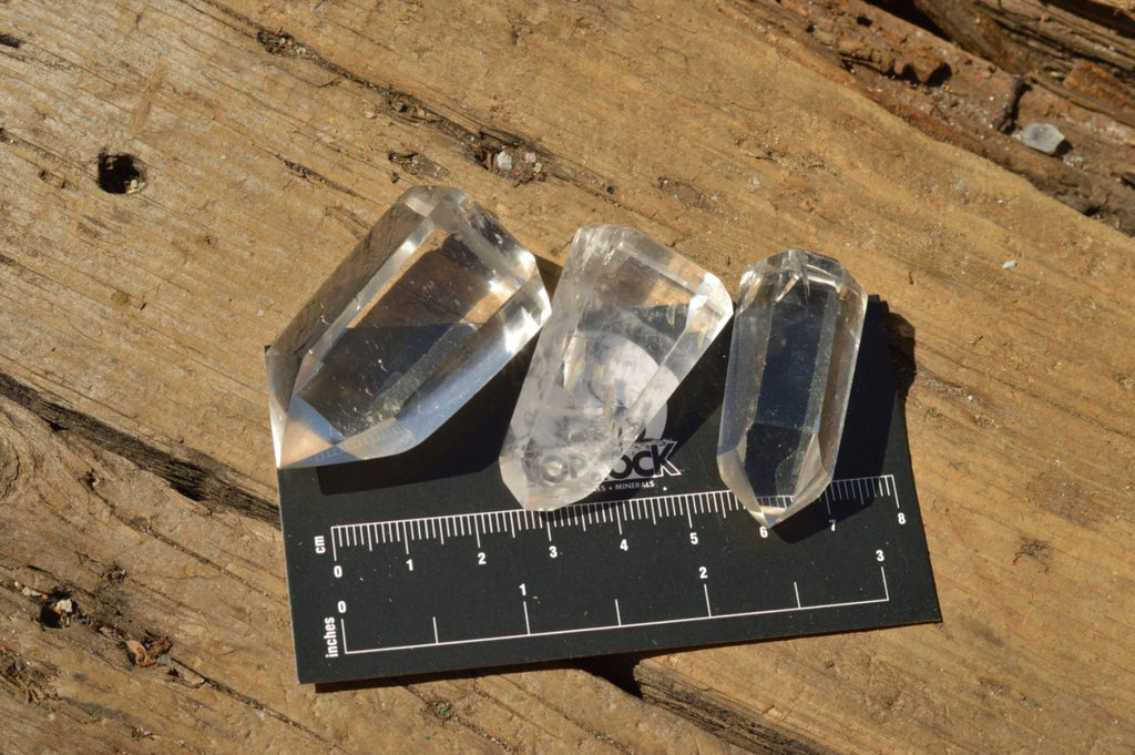 Polished Semi Optic Quartz Points  x 12 From Madagascar - TopRock