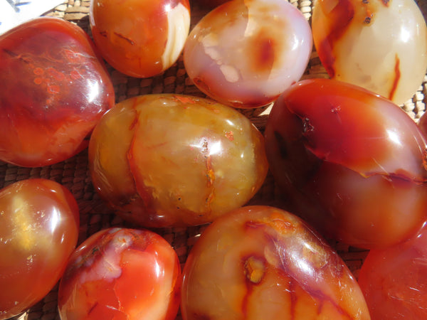 Polished Bright Red/ Orange Small to Medium Sized Carnelian Agate Palm Stones / Gallets - sold per kg - From Madagascar - TopRock
