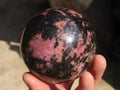 Polished Rhodonite Spheres x 2 From Ambindavato, Madagascar - Toprock Gemstones and Minerals 
