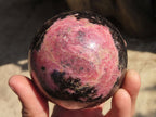 Polished Rhodonite Spheres x 2 From Ambindavato, Madagascar - Toprock Gemstones and Minerals 