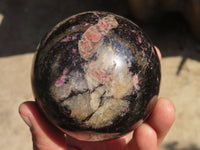 Polished Rhodonite Spheres x 2 From Ambindavato, Madagascar - Toprock Gemstones and Minerals 