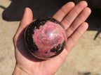 Polished Rhodonite Spheres x 2 From Ambindavato, Madagascar - Toprock Gemstones and Minerals 