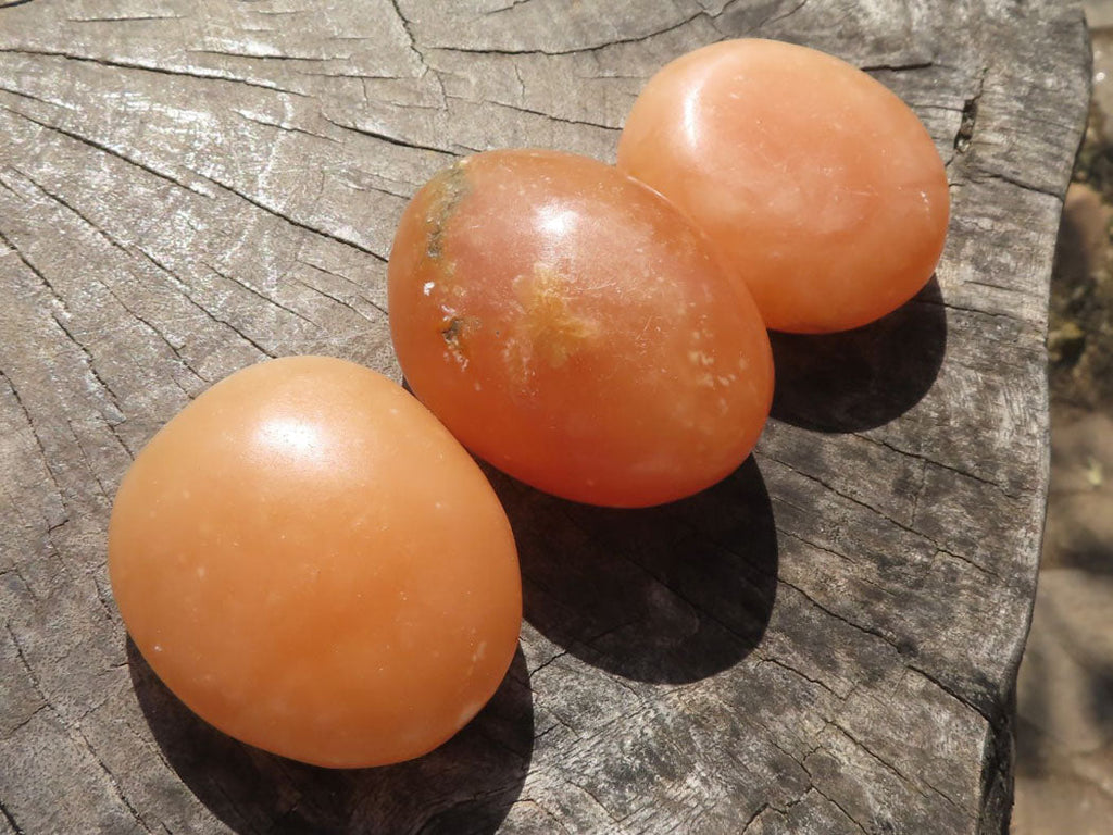 Polished Orange Twist Calcite Palm Stones  x 12 From Madagascar - TopRock
