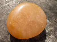 Polished Orange Twist Calcite Palm Stones  x 12 From Madagascar - TopRock