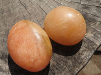 Polished Orange Twist Calcite Palm Stones  x 12 From Madagascar - TopRock