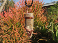 Polished Belemnite Bullet Fossil Rostrums In Copper Art Wire Wrap Pendant - sold per piece From Madagascar - TopRock
