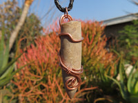 Polished Belemnite Bullet Fossil Rostrums In Copper Art Wire Wrap Pendant - sold per piece From Madagascar - TopRock