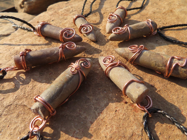 Polished Belemnite Bullet Fossil Rostrums In Copper Art Wire Wrap Pendant - sold per piece From Madagascar - TopRock