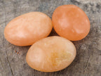 Polished Orange Twist Calcite Palm Stones  x 20 From Madagascar - TopRock