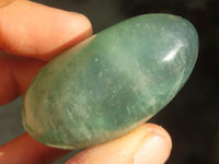 Polished Gemmy Emerald Fluorite Palm Stones  x 12 From Mandrosonoro, Madagascar