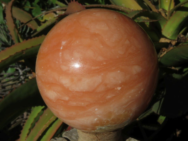Polished Large Orange Calcite Sphere with minor Intrusive exposures x 1 From Madagascar - TopRock