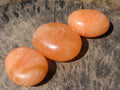 Polished Vibrant Orange Twist Calcite Palm Stones  x 12 From Madagascar - TopRock