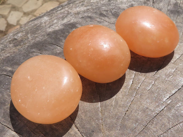 Polished Orange Twist Calcite Palm Stones  x 12 From Madagascar - TopRock
