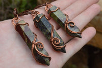 Polished Bastite (Epidote Piemontite) Dragons Blood Stone Crystals Set In Copper Art Wire Wrap Pendant - sold per piece - South Africa - TopRock