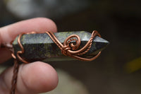 Polished Bastite (Epidote Piemontite) Dragons Blood Stone Crystals Set In Copper Art Wire Wrap Pendant - sold per piece - South Africa - TopRock